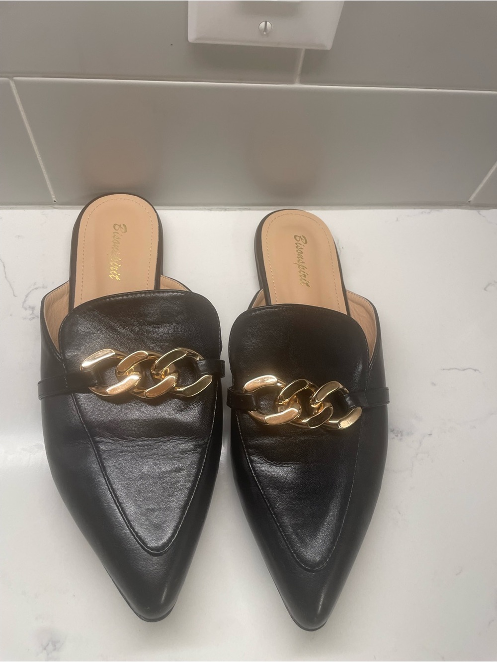Black Pointed Leather Mules with Gold Chain Accent